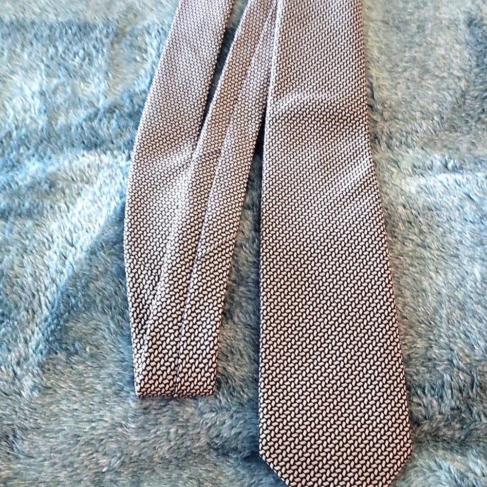Black and white tie.  100% silk.